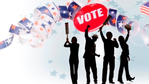 Supporters at political rally with patriotic ribbon and Vote pin